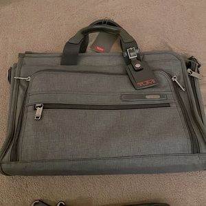 Tumi Slim Deluxe Portfolio computer bag.  Brand new. Never been used.